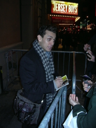 Michael Longoria signing autographs at the stage door.